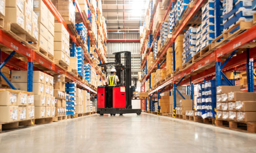 Forklift in high-bay warehouse racking